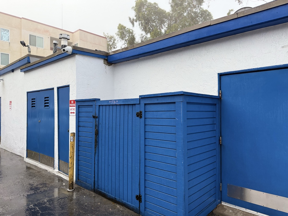 pressure washing job removing algae from a San Diego driveway