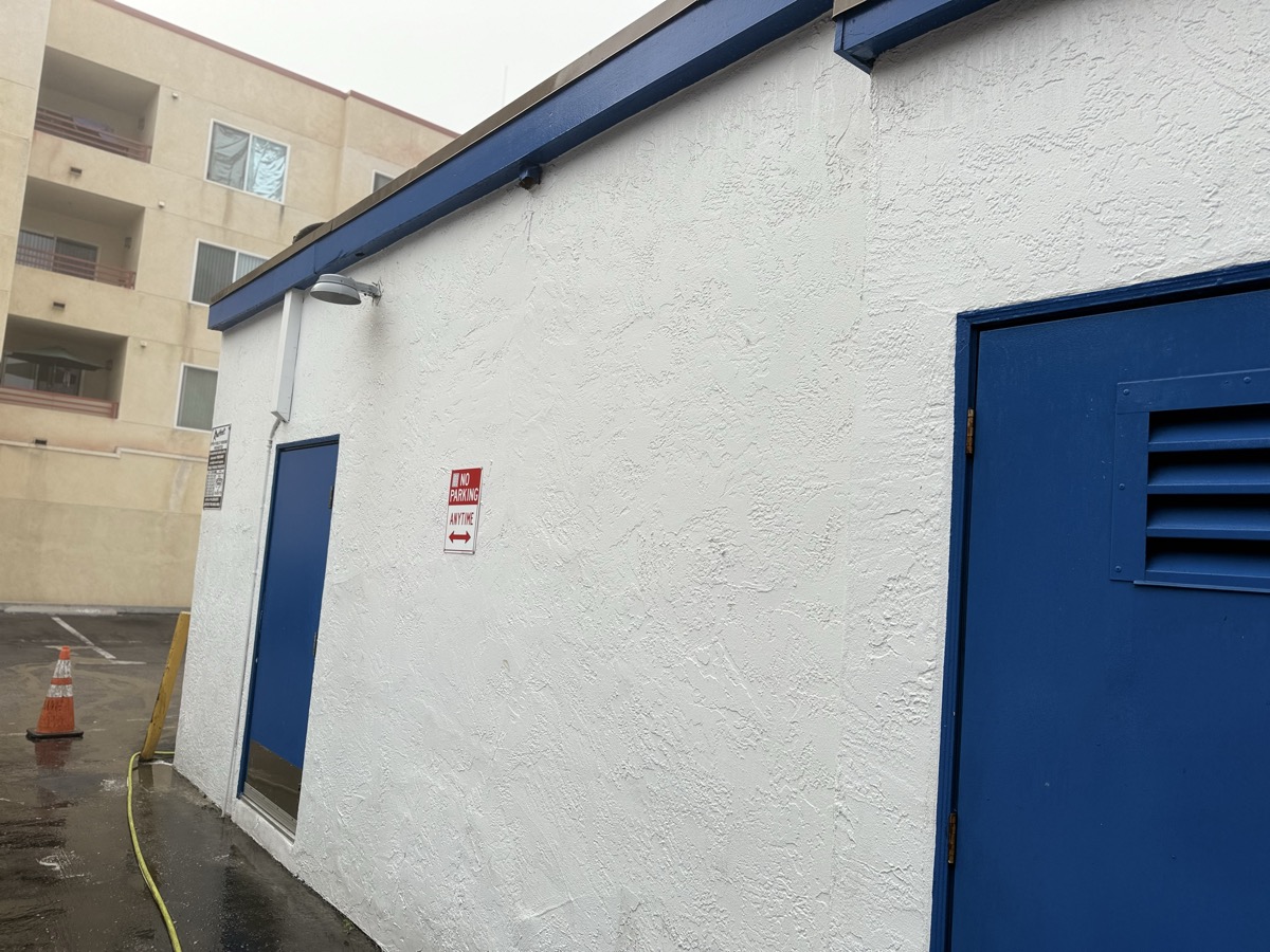 Clean exterior surface after professional soft washing by Integrity Pro Washers in San Diego